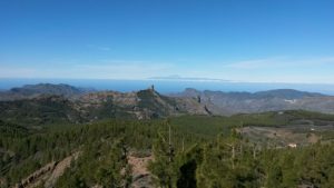Two in one: the landmarks of Gran Canaria (Roque Nublo) and Tenerife in the background (Teide volcano)...